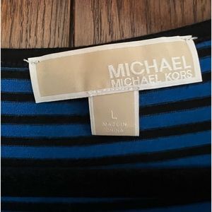 Beautiful color blue shirt. Great condition. No smoking environment.